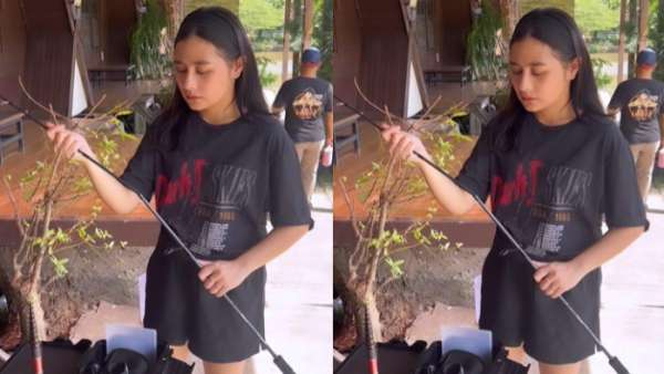 Prilly pergi mancing memakai kaus dan celana pendek warna hitam