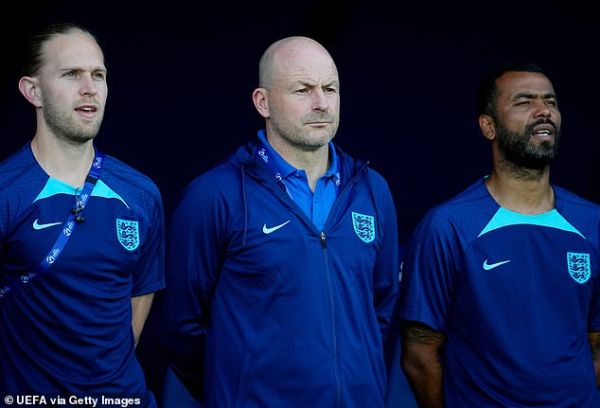 Carsley (centre) had previously not sung the anthem as head coach of the England Under-21s