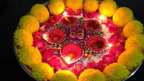 pooja thali Decoration with  diya and Flowers accc