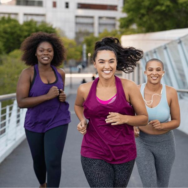 three women running outside