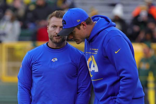 Head coach Sean McVay of the Los Angeles Rams speaks with offensive coordinator Kevin O'Connell prior to a game against the Green Bay Packers at Lambeau Field on November 28, 2021 in Green Bay, Wisconsin. The Packers defeated the Rams 36-28.