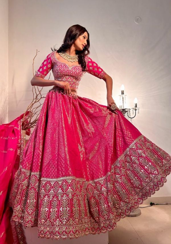 Vibrant pink lehenga for Karwa Chauth look. 