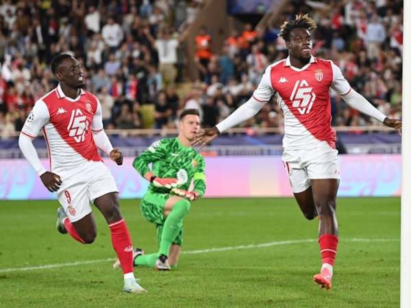 George Ilenikhena of Monaco celebrates scoring against Barcelona on September 19, 2024