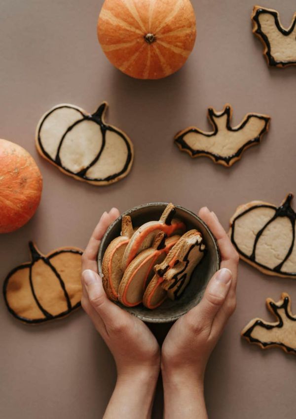 Halloween cookies on table and in bowl