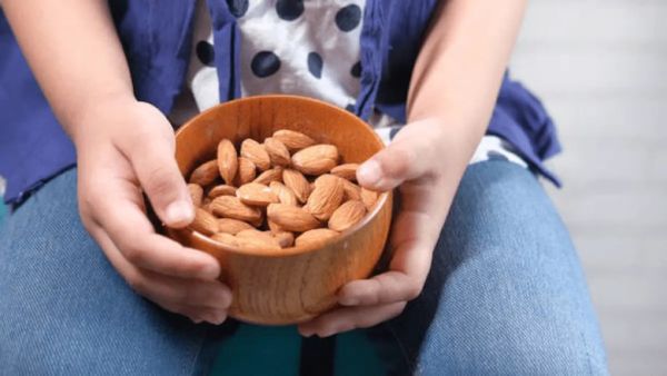 Give almonds to children in limited quantity