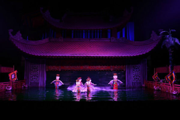 Photo of a water puppet show at the theatre. Photo by AFP/Manan Vatsyayana