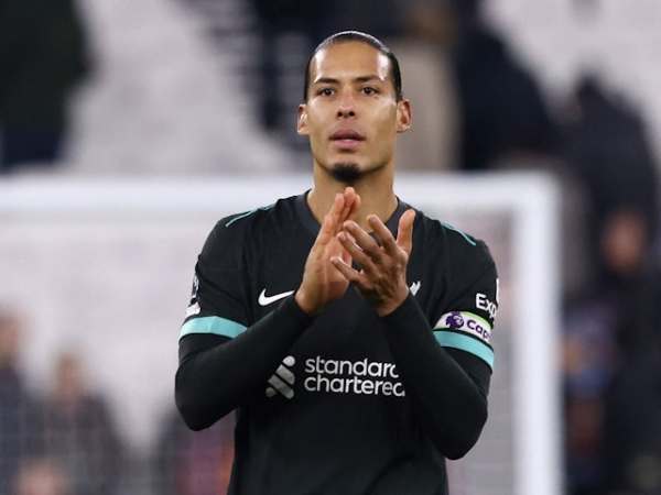 Virgil van Dijk of Liverpool celebrates at full-time after his side's Premier League match against West Ham United, on December 29, 2024