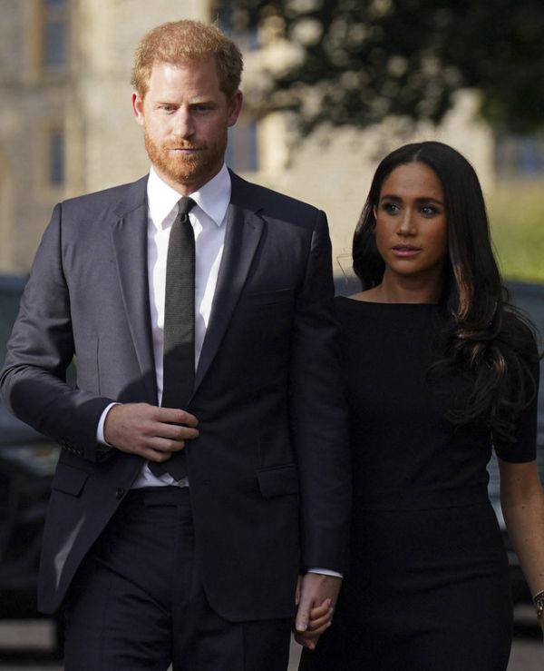 Meghan Marke dan Pangeran Harry. Foto: Kirsty O'Connor/POOL/AFP