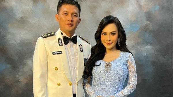 AKBP Levi Defriansyah dan istri