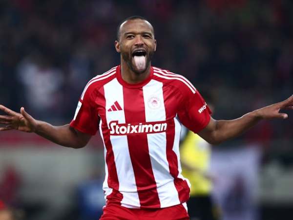 Olympiacos forward Ayoub El Kaabi celebrates scoring on November 24, 2024