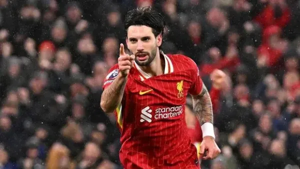 LIVERPOOL, ENGLAND - FEBRUARY 26: (SUN OUT, SUN ON SUNDAY OUT) Dominik Szoboszlai of Liverpool celebrates scoring his team's first goal during the Premier League match between Liverpool FC and Newcastle United FC at Anfield on February 26, 2025 in Liverpool, England. (Photo by Liverpool FC/Liverpool FC via Getty Images)