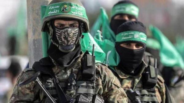 SAYAP MILITER HAMAS - Personel Brigade Al Qassam, Sayap Militer Gerakan Perlawanan Palestina, Hamas, dalam sebuah parade militer di Jalur Gaza beberapa waktu lalu. Hamas membantah menyetujui usulan AS untuk memperpanjang gencatan senjata dan menyerukan Israel untuk melanjutkan negosiasi Tahap II gencatan senjata di mana pasukan Israel harus menarik diri dari Gaza dan membuka akses masuk bantuan kemanusiaan.