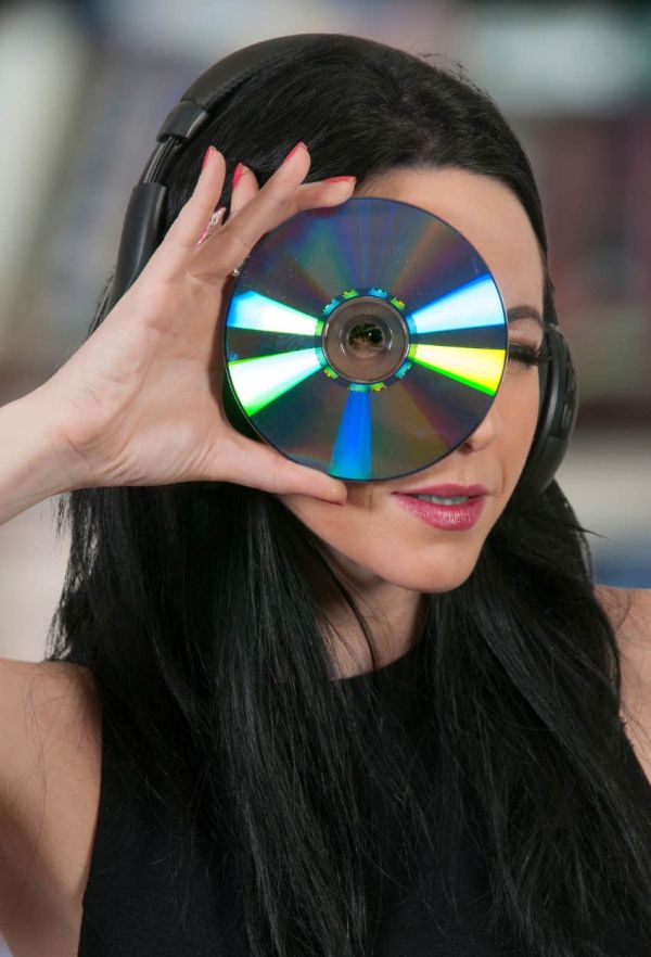 Milennial woman owning DVDs gives away her age