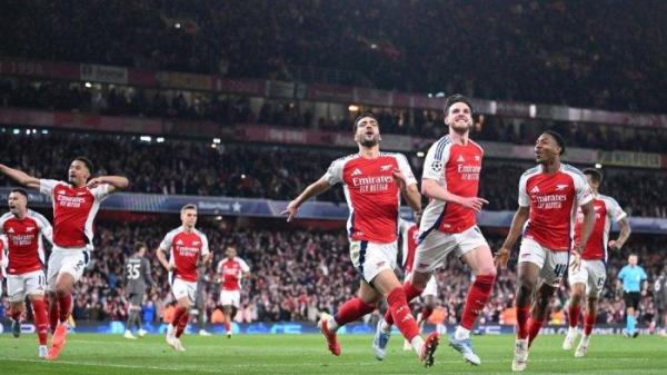 MENANG TELAK - Pemain Arsenal selebrasi usai cetak gol ke gawang Real Madrid. Arsenal berhasil menang telak 3-0 atas Real Madrid pada leg pertama 8 besar Liga Champions 2024-2025. Laga leh kedua Real Madrid vs Arsenal digelar, Kamis (17/4/2025)