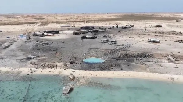 A drone view shows charred vehicles standing in the aftermath of what Al Masirah TV said was a U.S. strike on the Ras Isa fuel port, Al Jazirah, Yemen, in this screengrab from a handout video released on April 18, 2025. Al-Masirah TV/Handout via REUTERS THIS IMAGE HAS BEEN SUPPLIED BY A THIRD PARTY.