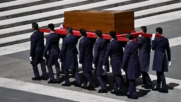 Pallbearers carry the coffin during late Pope Francis' funeral ceremony at St Peter's Square at the Vatican on April 26, 2025. (Photo by Filippo MONTEFORTE / AFP)