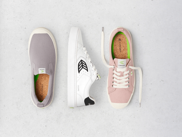 Three Cariuma sneakers, in light purple, white and light pink