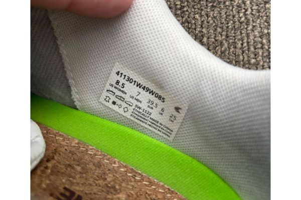 An inside look at the interior of a Cariuma Sneaker that says where it's made.