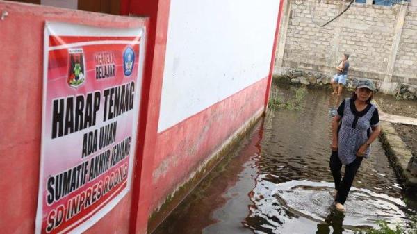 DANAU TONDANO - Lokasi banjir luapan Danau Tondano di Kelurahan Ro'ong, Tondano Barat, Minahasa, Kamis (12/6/2025).