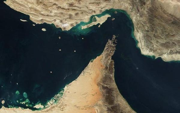 Satellite view of the Strait of Hormuz with Iran on top and Gulf states including the United Arab Emirates below. (NASA Photo)