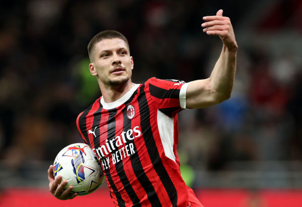 MILAN, ITALY - APRIL 05: Luka Jovic of AC Milan celebrates scoring his team's second goal during the Serie A match between AC Milan and Fiorentina at Stadio Giuseppe Meazza on April 05, 2025 in Milan, Italy. (Photo by Marco Luzzani/Getty Images)
