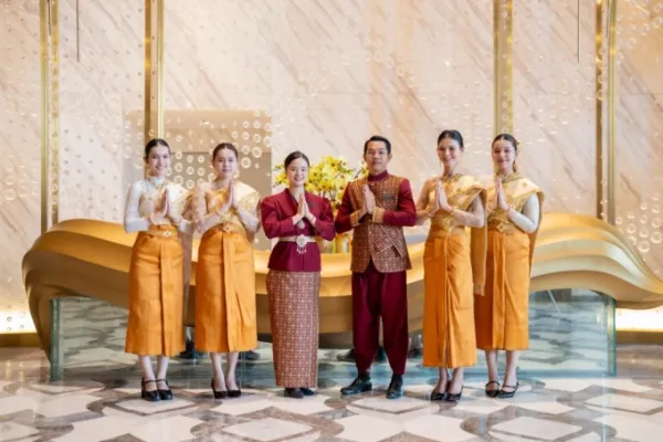 The resorts staff are dressed in Cambodias traditional uniform. Photo courtesy of Arjuna Resort & Spa