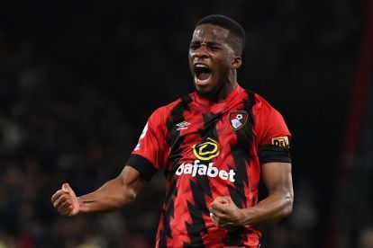Bournemouth midfielder Hamed Traore (R) celebrates their opening goal during the English Premier League football match between Bournemouth and Newcastle United at the Vitality Stadium in Bournemouth, southern England on February 11, 2023. (Photo by Glyn KIRK / AFP) (Photo by GLYN KIRK/AFP via Getty Images)