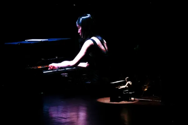 Nguyen Nhat Vy playing piano at the concert. Photo courtesy of Joy of ADHD & Autism
