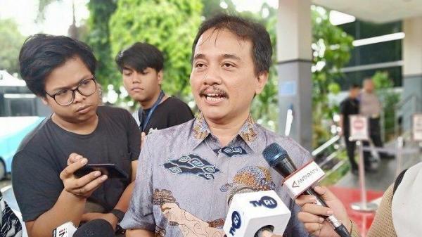 POTRET ROY SURYO - Pakar telematika Roy Suryo di SPKT Polda Metro Jaya, Jakarta Selatan, Jumat (24/1/2020). Roy Suryo sampai saat ini masih meragukan klaim Bareskrim Polri soal hasil uji forensik ijazah Jokowi.