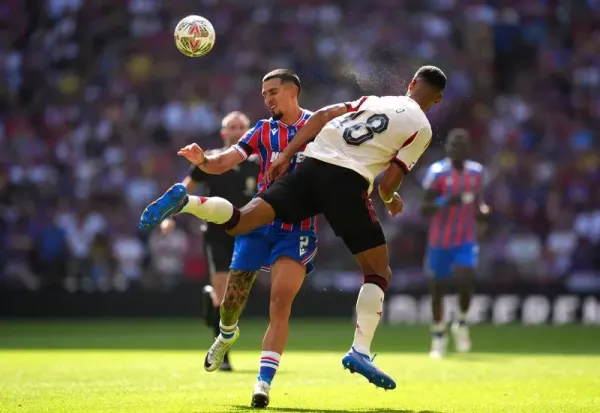 Crystal Palace's Daniel Munoz and Liverpool's Cody Gakpo battle for the ball during the FA Community Shield match at Wembley Stadium, London. Picture date: Sunday August 10, 2025. (Photo by Adam Davy/PA Images via Getty Images)