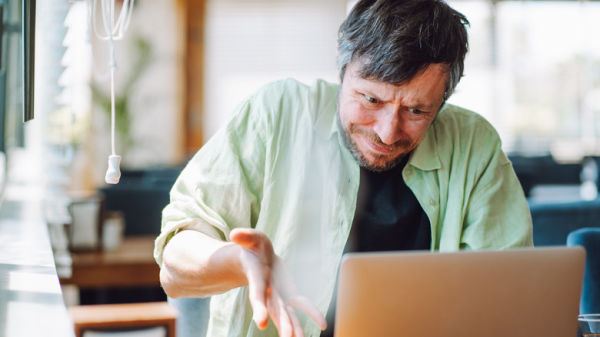 person having trouble with their laptop