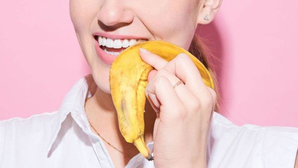   yellow teeth cleaning by banana peel