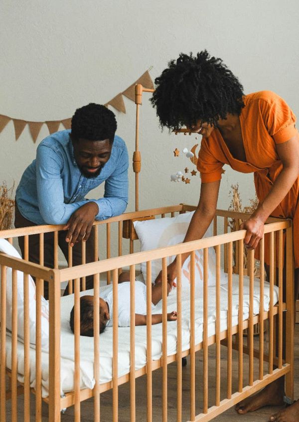 husband and wife with their infant child