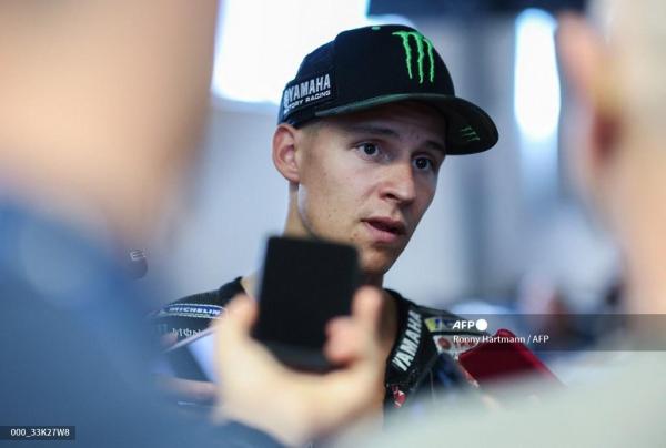QUARTARARO - Pebalap Yamaha Monster Energy Team Fabio Quartararo berbicara kepada media setelah latihan bebas kedua untuk Grand Prix MotoGP Jerman di sirkuit Sachsenring, pada 16 Juni 2023. (Foto Arsip Juni 2023). Ronny Hartmann / AFP