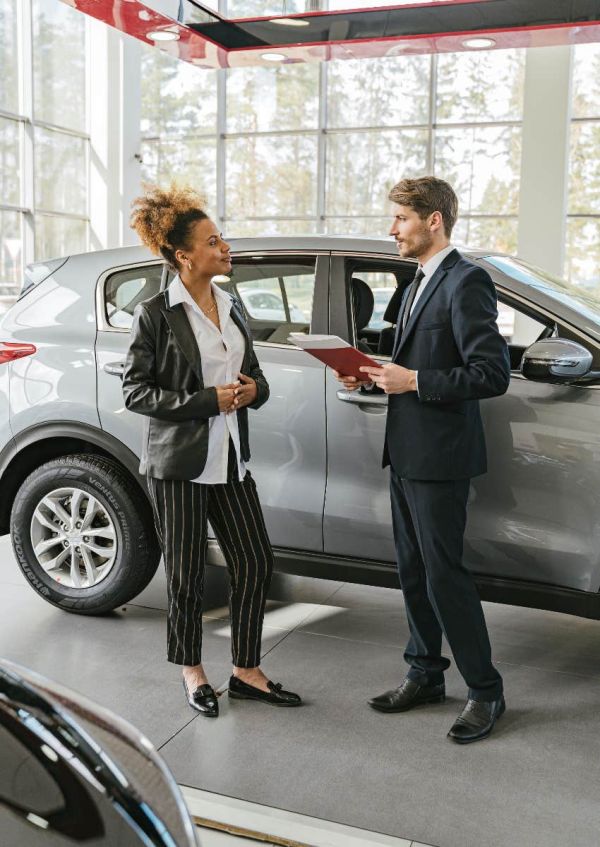 woman shopping for a new car