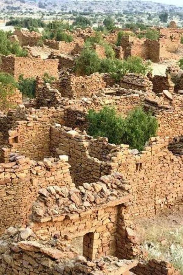 This may contain: an old pueblo in the middle of nowhere