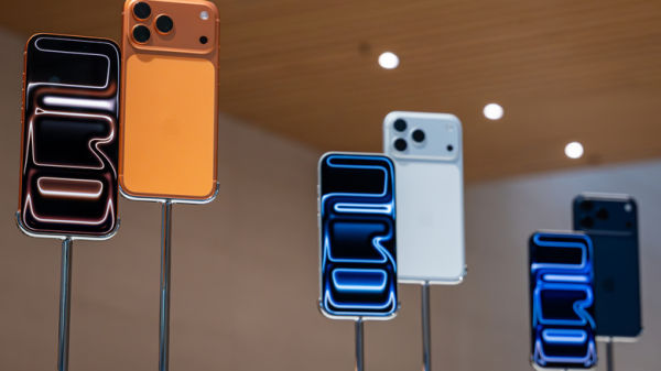 iPhone 17 Pro and iPhone 17 Pro Max models are displayed inside the Apple Inc. store