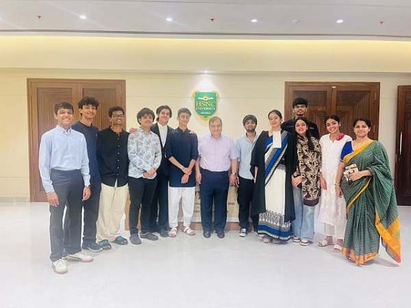Guest of Honour Mr. Anil Harish, Provost, HSNC University with the winning student team from D.M. Harish School of Law