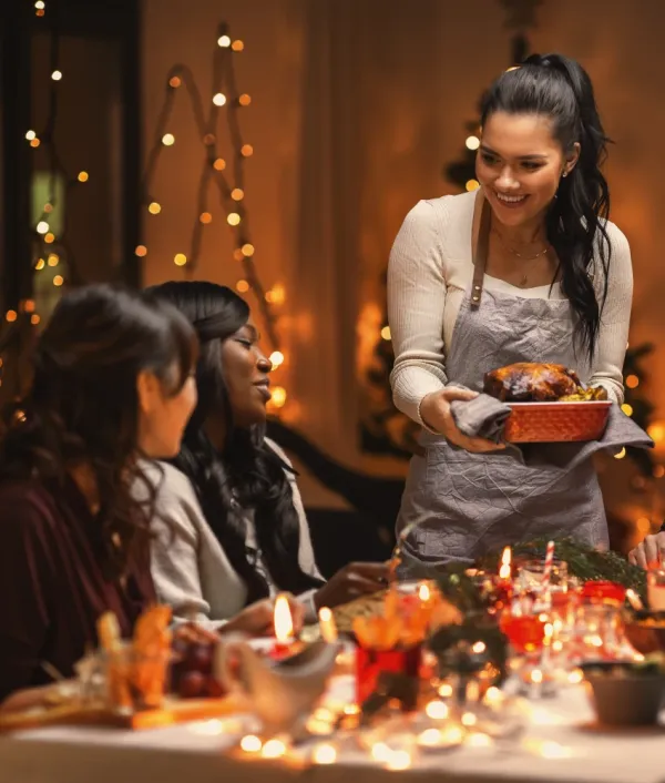 woman serving holiday meal