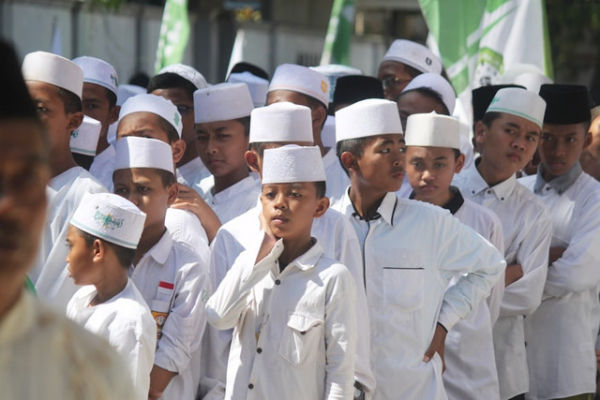 Ilustrasi susunan acara apel Hari Santri Nasional, foto: unsplash/Mufid Majnun