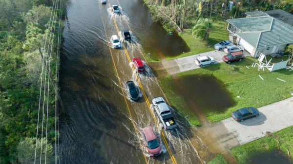 Car driving on a flooded road in Florida