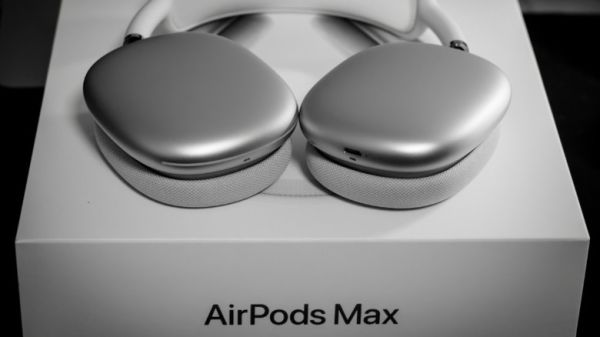 AirPods Max on top of their product box