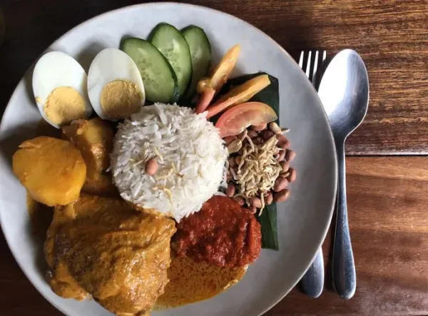 Lemak Lemang, traditional Malaysian food made of glutinous rice, coconut milk and salt. Cooked in a hollowed bamboo stick lined with banana leaves. Served during ramadan festival or hari raya.