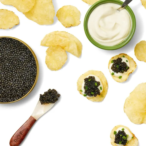 Gourmand roe caviar, potato chips, and sour cream.