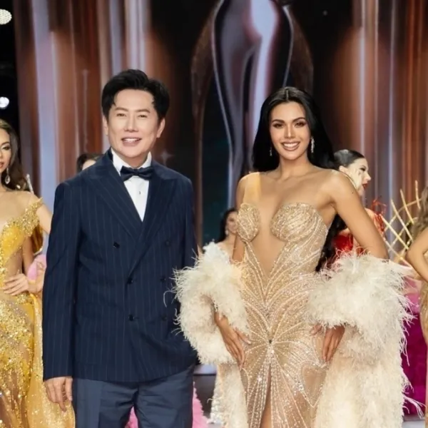 Miss Grand International president Nawat Itsaragrisil (L) stands next to the titleholder of the 2024 MGI pageant. Photo from Itsaragrisils Instagram