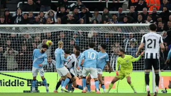 Soccer Football - Premier League - Newcastle United v Manchester City - St James' Park, Newcastle, Britain - November 22, 2025 Newcastle United's Harvey Barnes celebrates scoring their second goal Action Images via Reuters/Lee Smith EDITORIAL USE ONLY. NO USE WITH UNAUTHORIZED AUDIO, VIDEO, DATA, FIXTURE LISTS, CLUB/LEAGUE LOGOS OR 'LIVE' SERVICES. ONLINE IN-MATCH USE LIMITED TO 120 IMAGES, NO VIDEO EMULATION. NO USE IN BETTING, GAMES OR SINGLE CLUB/LEAGUE/PLAYER PUBLICATIONS. PLEASE CONTACT YOUR ACCOUNT REPRESENTATIVE FOR FURTHER DETAILS..