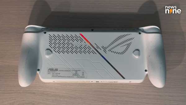 The reflective slash on the back of the device is eye-catching. (Image Credit: Aditya Madanapalle/News9). 