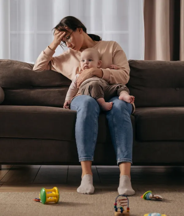 Woman who loves her baby but doesn't always love being a mom