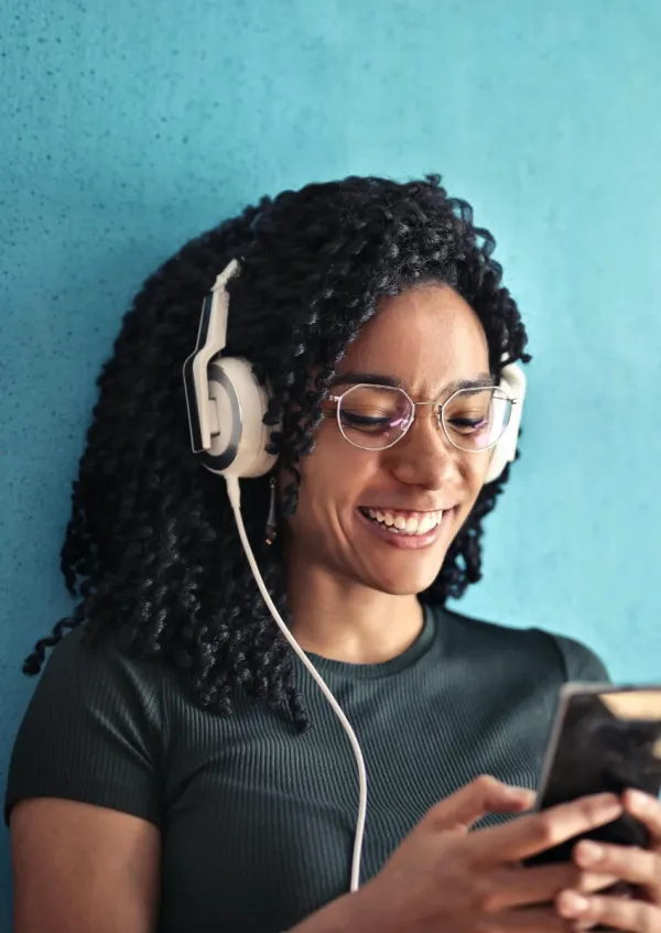 woman listening to music on Spotify