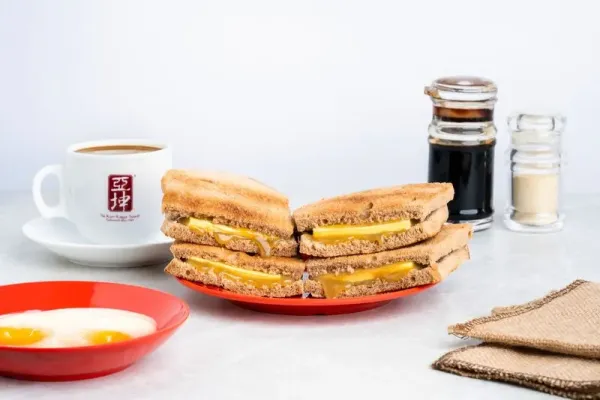 Pria Ini Nekat Tato Logo Kedai Sarapan Favoritnya di Singapura Pria Ini Nekat Tato Logo Kedai Sarapan Favoritnya di Singapura